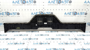 Chrysler Pacifica 2nd row rear floor trim, type 2, brown, broken edge, needs cleaning
