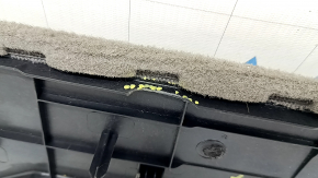 Chrysler Pacifica 2nd row rear floor trim, type 2, brown, broken edge, needs cleaning
