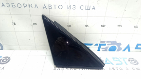 Triangle plug for the front right door of an Audi Q3 83A 19-25, glossy black, scratches