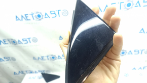 Triangle plug for the front left door of an Audi Q3 83A 19-25, glossy black, scratches