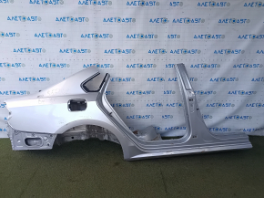 Quarter wing rear right VW Passat b7 12-15 USA silver on body, pokes