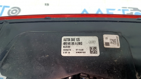Left rear bumper light for an Audi Q7 (16-25 scratches)