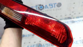 Left rear bumper light for an Audi Q7 (16-25 scratches)
