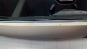 Kia EV6 22-24 black and gray center console trim with cup holders, backlit, cracks, scratches, paint blistering