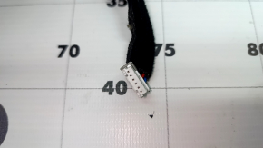 Kia EV6 22-24 black and gray center console trim with cup holders, backlit, cracks, scratches, paint blistering