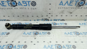 The rear left shock absorber of the Audi Q3 83A 19-25 is dented.