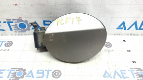 Fuel filler door with housing Chrysler Pacifica 17-