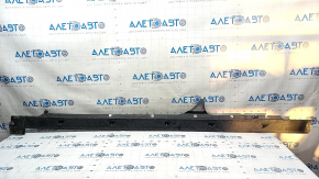 The right door sill protection for an Audi Q7 16-25 is worn.