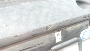 The left door sill guard for an Audi Q7 16-25 is worn and cracked.