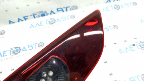 Left inner trunk lid light for Mazda 3 19-22 4D, scratches