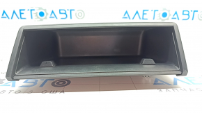 The Tesla Model X 16-21 front panel niche under the monitor is worn out. 
