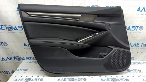 Front left door panel for a 2020 Honda Accord, black leather, carbon fiber insert with chrome molding, scratches, needs cleaning