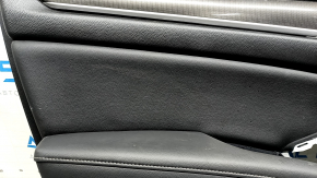 Front left door panel for a 2020 Honda Accord, black leather, carbon fiber insert with chrome molding, scratches, needs cleaning