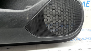 Front left door panel for a 2020 Honda Accord, black leather, carbon fiber insert with chrome molding, scratches, needs cleaning