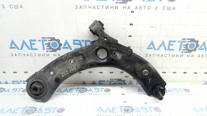 The front right lower control arm of a Mazda 3 19-23 Mexico-built model has a torn boot.