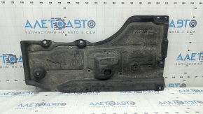 The rear right underbody protection of the Mazda 3 19-24 FWD Mexico built is worn.