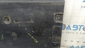 Front left underbody protection for Mazda 3 19-24 is worn and dented.