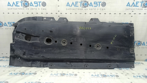 The front right underbody protection of a Mazda 3 19-24 is worn out.