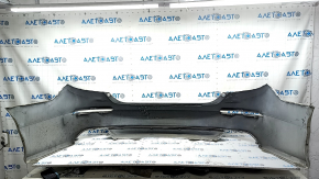 The rear bumper is bare, Honda Accord 18-22, red, with broken fasteners and filed down.