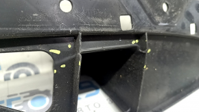 Rear bumper mount, center lower, Mazda 3 19-24 4d Mexico built, pressed, broken mount