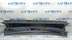 The wiper grille is plastic and faded on a Toyota Highlander 20-25.