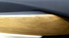 Tesla Model X 16-21 front left door panel, black and beige leather, light wood molding, tears and nicks in the leather, scratches, dents