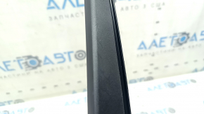 Toyota Highlander 20-25 black, front right inner door trim, scratches