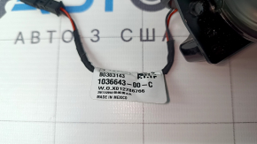 Door light in the rear left trim panel of the Tesla Model X 16-21