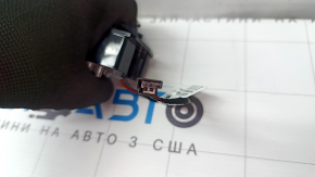 Door light in the rear left trim panel of the Tesla Model X 16-21