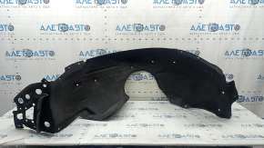 The front left fender liner of a Honda Accord 18-22 is torn at the mounting point.