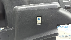 Left arch trim for a 2022 Toyota Highlander, black, hybrid, with cup holders and caps, scratches