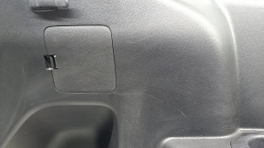 Left arch trim for a 2022 Toyota Highlander, black, hybrid, with cup holders and caps, scratches
