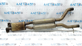 The exhaust pipe, the middle part of the Jaguar F-Pace X761 17-25, is rusty and dented.