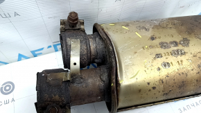 The exhaust pipe, the middle part of the Jaguar F-Pace X761 17-25, is rusty and dented.