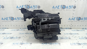 The heater housing is bare, air conditioning, left side of Mazda 3 19-23 under auto