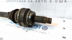The rear left half-shaft drive of the BMW X5 X6 E70 E71 07-13 has a dented casing.