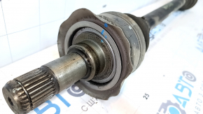 The rear left half-shaft drive of the BMW X5 X6 E70 E71 07-13 has a dented casing.