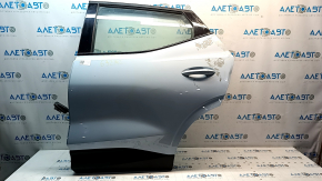 Door assembly rear left Chevrolet Bolt EUV 22-23 blue WA621G, dented