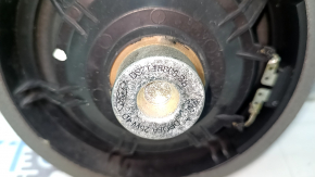 The front left door speaker of a Ford Fusion mk5 13-20 has a broken guide.
