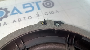 The front left door speaker of a Ford Fusion mk5 13-20 has a broken guide.