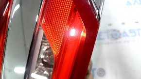 Left inner tailgate light for Ford Fusion mk5 19-20 halogen with chrome level 1. Scratches.