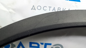 Tesla Model X 16-21 front right fender arch trim, loose fasteners, scratches