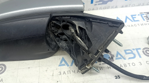 Right side mirror assembly for Toyota Sienna 21-24, 6 pins, heated, BSM, silver, pins, worn, missing housing part