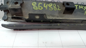 The left front bumper mudguard of a Tesla Model X 16-21 is sawed off and the mount is broken.