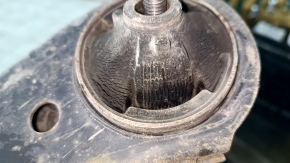 The lower front right control arm of a Toyota Sienna 21-24 has a cracked silent block.