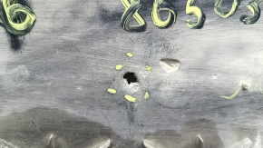 Tesla Model X 16-21 front bumper guard is scuffed, dented, and has tears