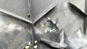 Tesla Model X 16-21 front bumper guard is scuffed, dented, and has tears