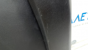 Tesla Model 3 18 rear passenger seat trim panel - black, scratches