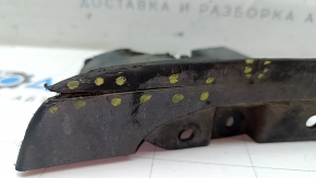 Tesla Model X 16-21 rear right mudguard with tears, scuffs, and cracks