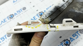 The upper radiator grille cover of the Mazda 6 18-21 is broken, the fasteners are broken